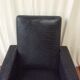 Fauteuil en Skaï noir vintage 50/60
