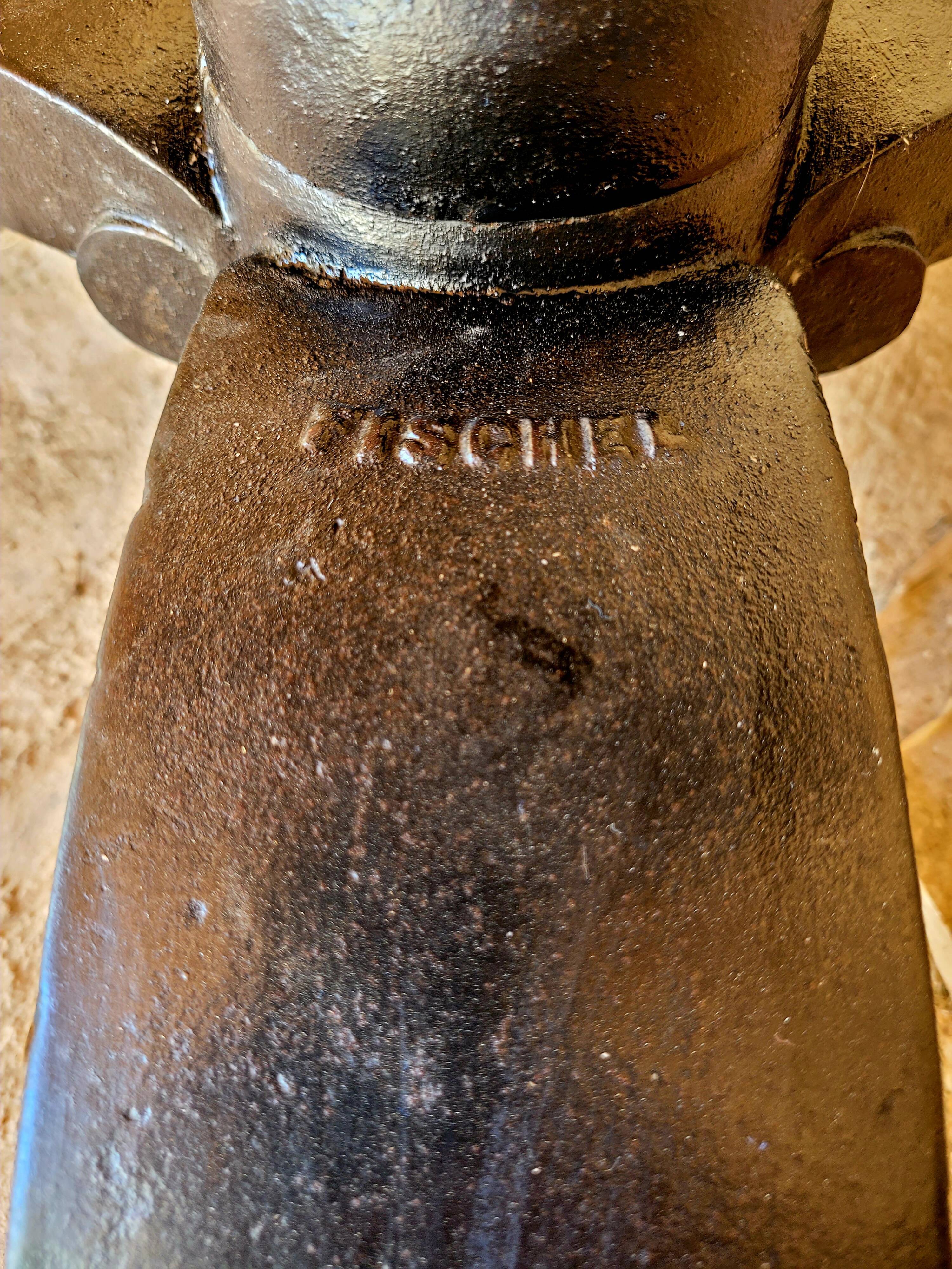 Old vintage bistro table brand Fischel in cast iron