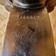 Old vintage bistro table brand Fischel in cast iron