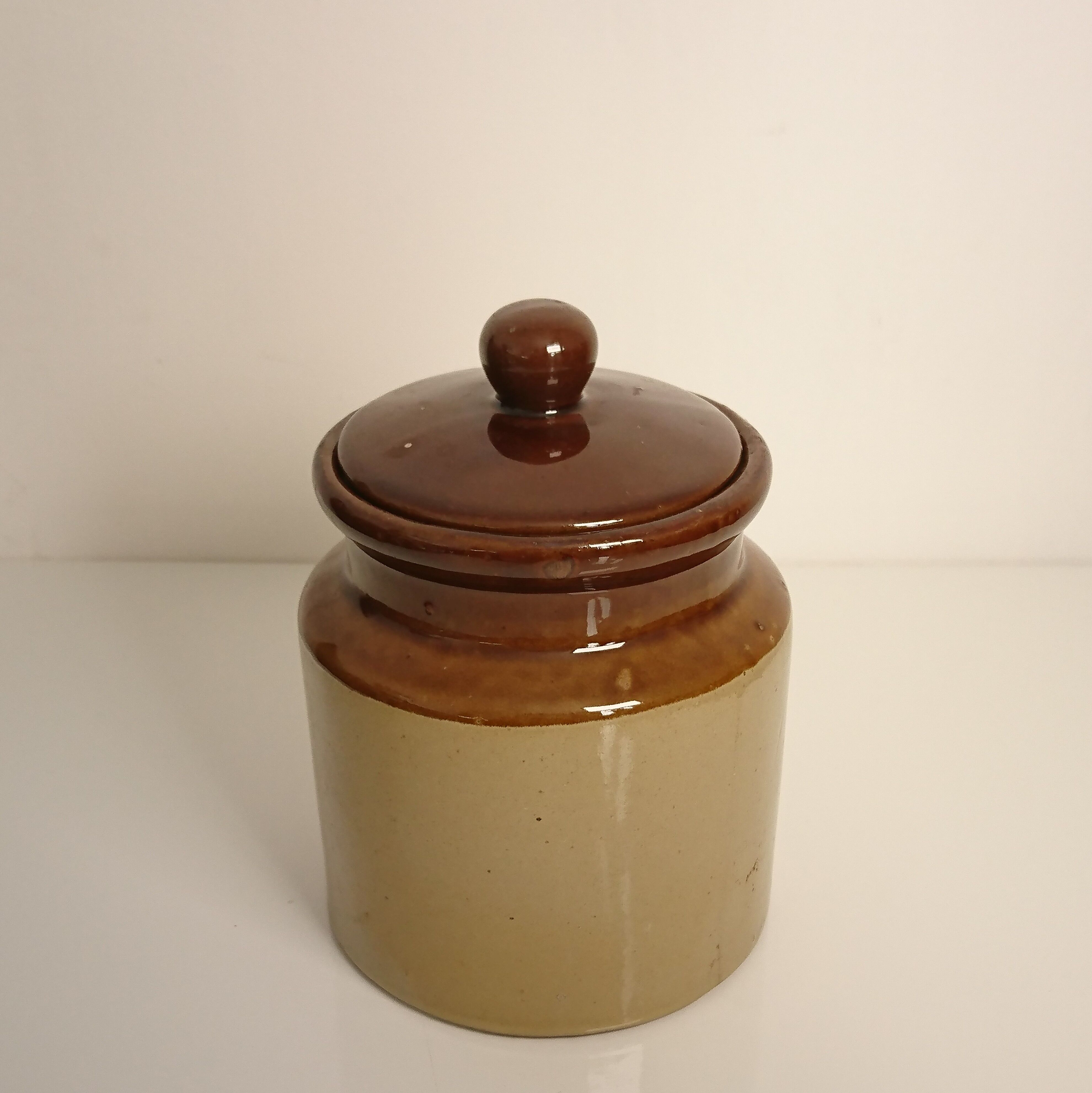 Beige and brown mustard pot