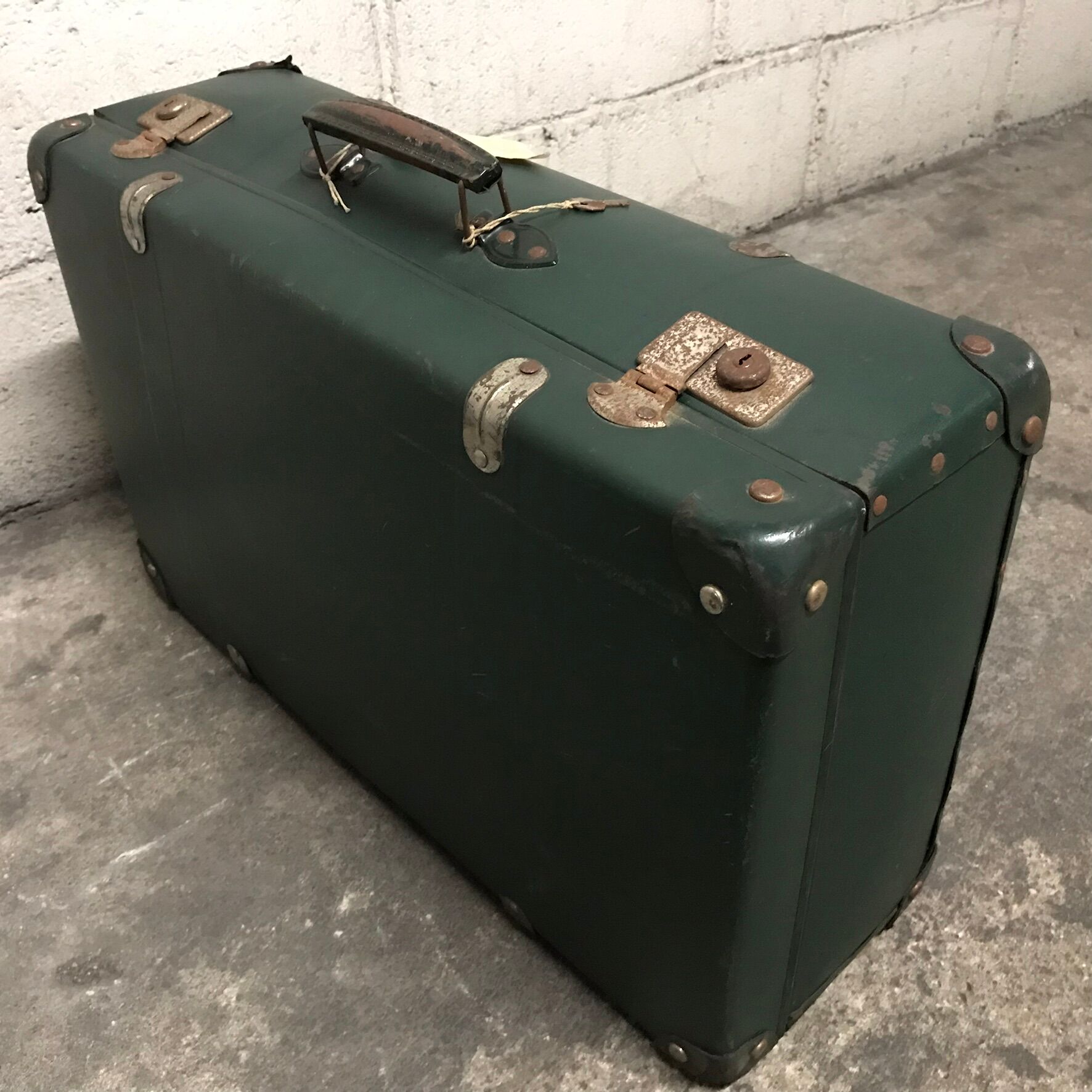 Vintage green case in vulcanized fiber