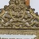 Old bevel mirror with metal parcloses pushed back Louis XIV style