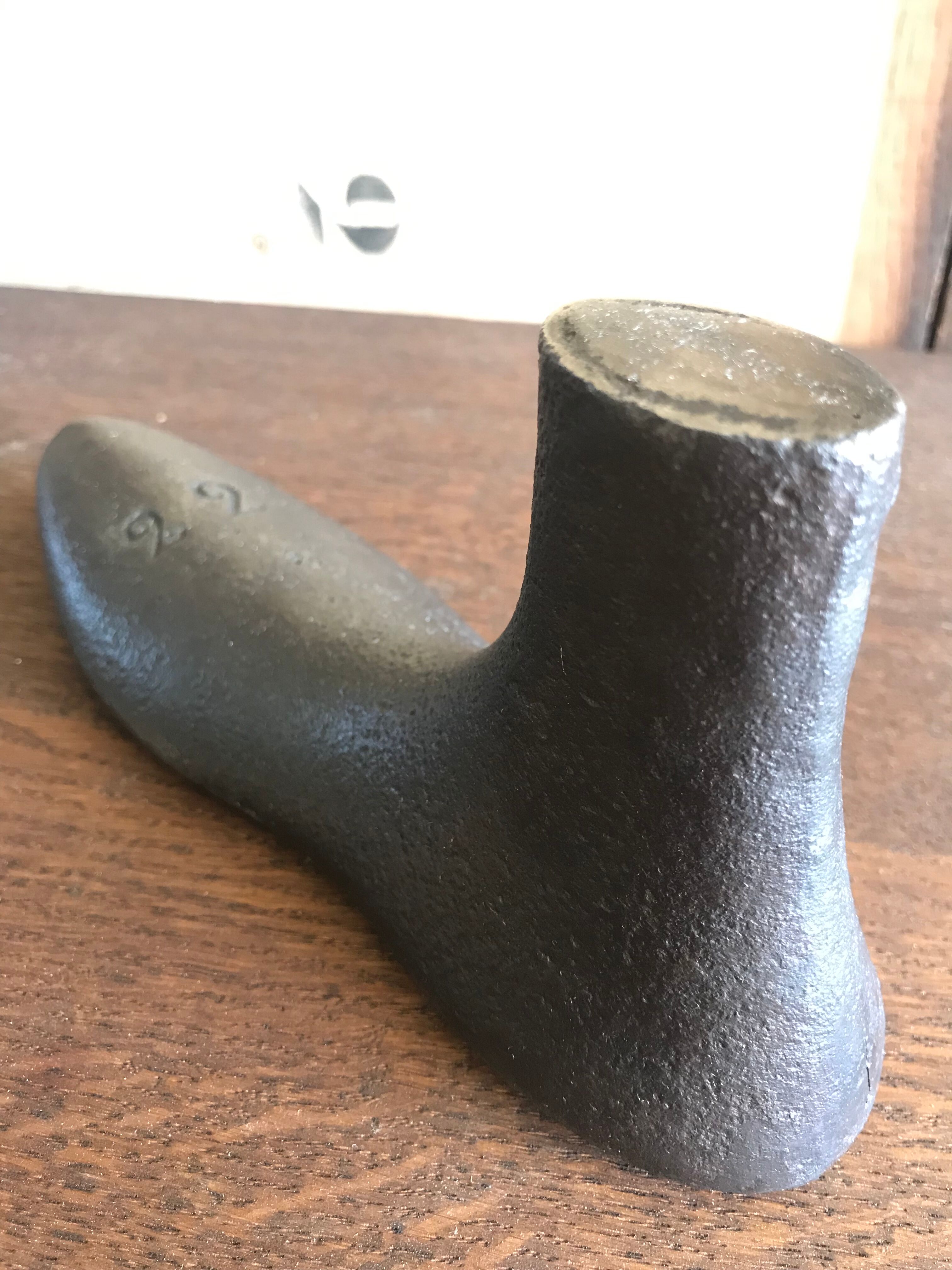 Foot shape vintage metal shoemaker
