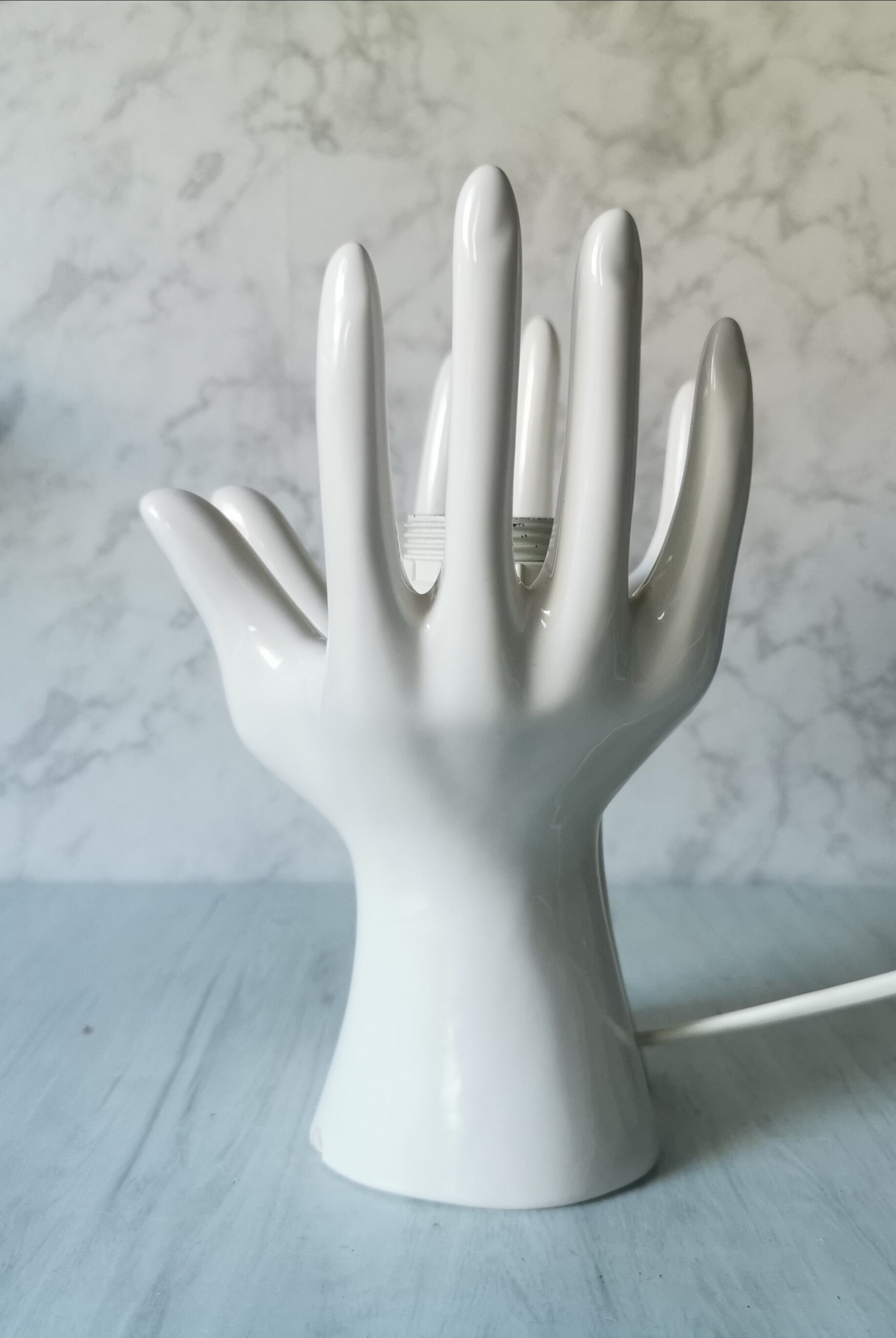 White ceramic hand lamp