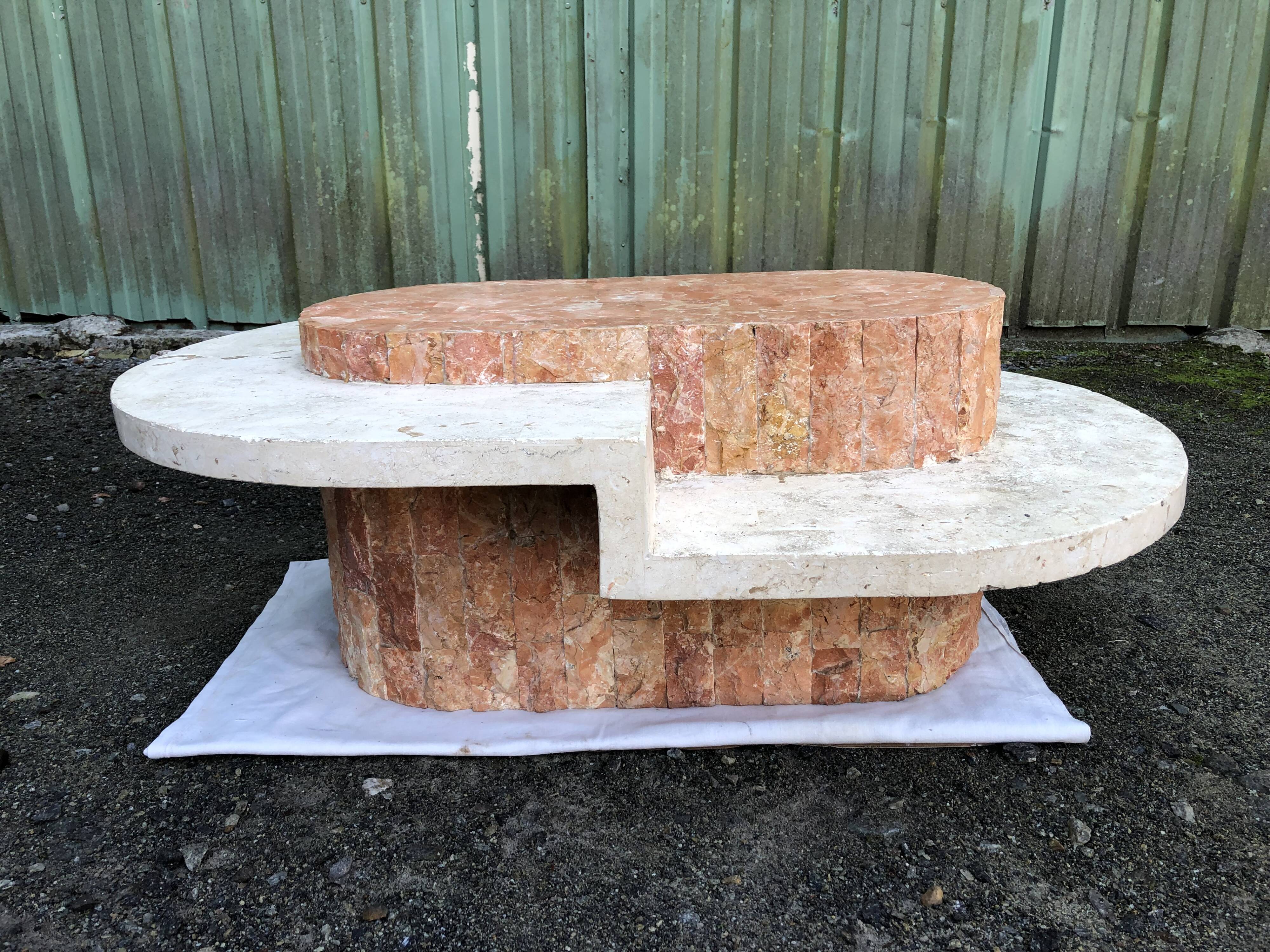 Vintage asymmetrical design coffee table in Mactan travertine stones by Magnussen ponte.