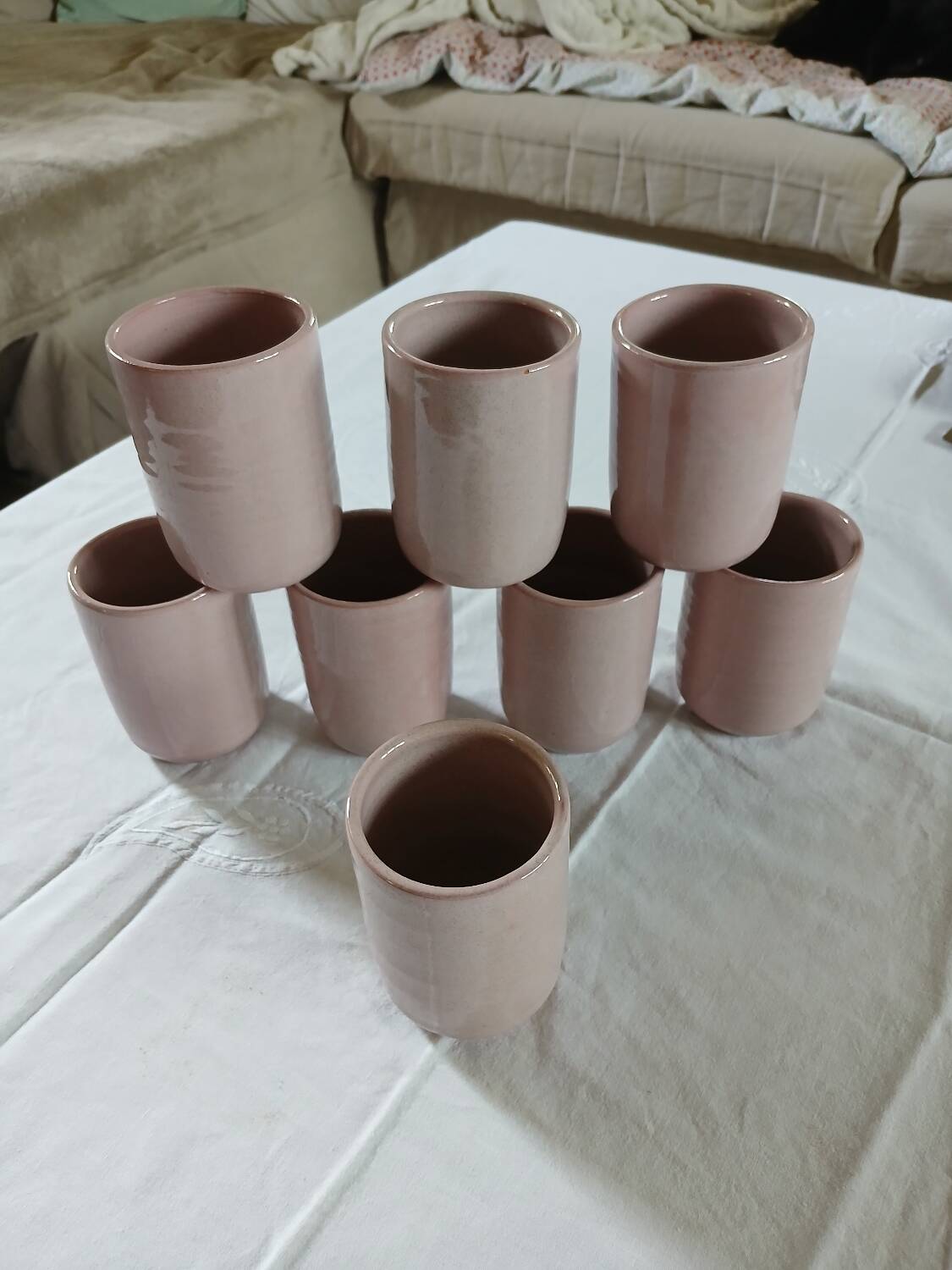 8 signed enamelled ceramic mugs