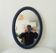 Vintage oval mirror in petrol blue wood