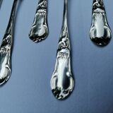 8 small silver spoons
