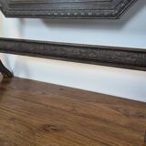 Antique beveled octagonal vanity mirror in carved wood
