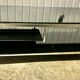 Table basse design vintage chrome et verre fumé noir sur roulettes