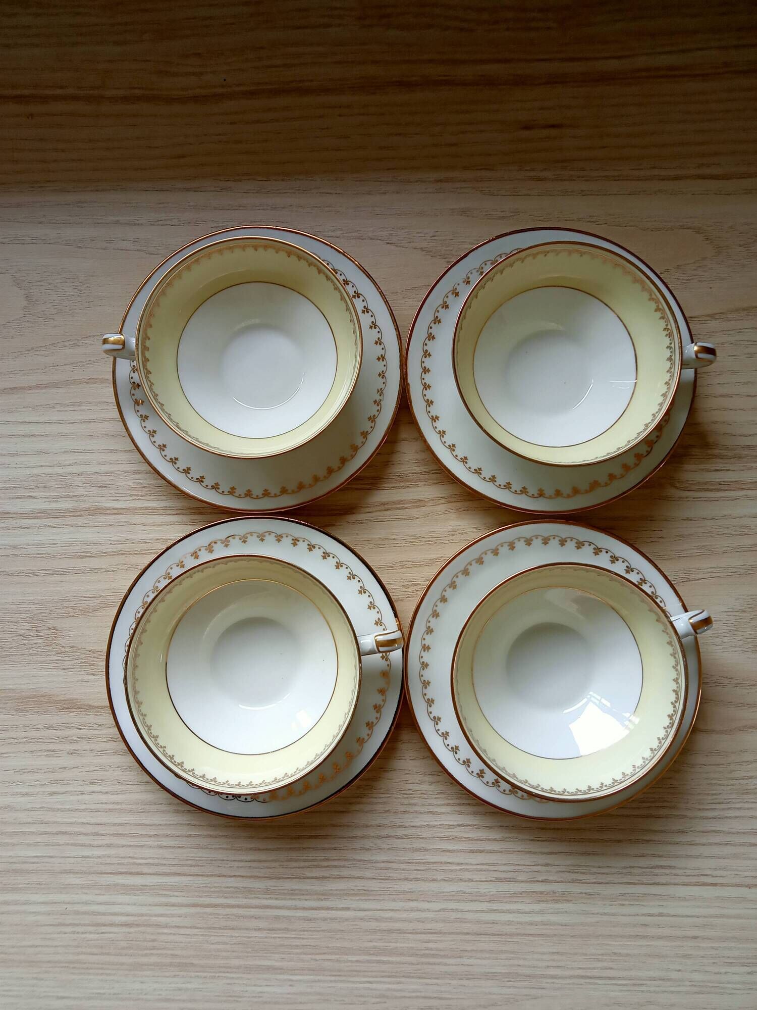 4 cups with 4 saucers Limoges, fine porcelain, coffee cups, white, light green, gold