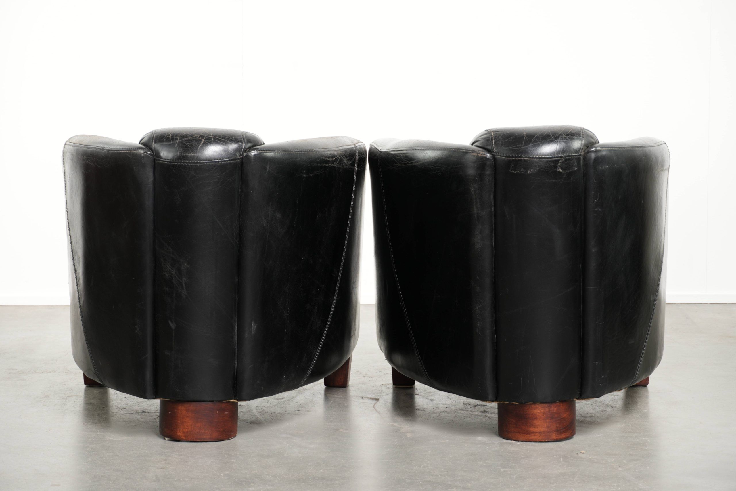 Set of two black vintage cowhide aviator design armchairs