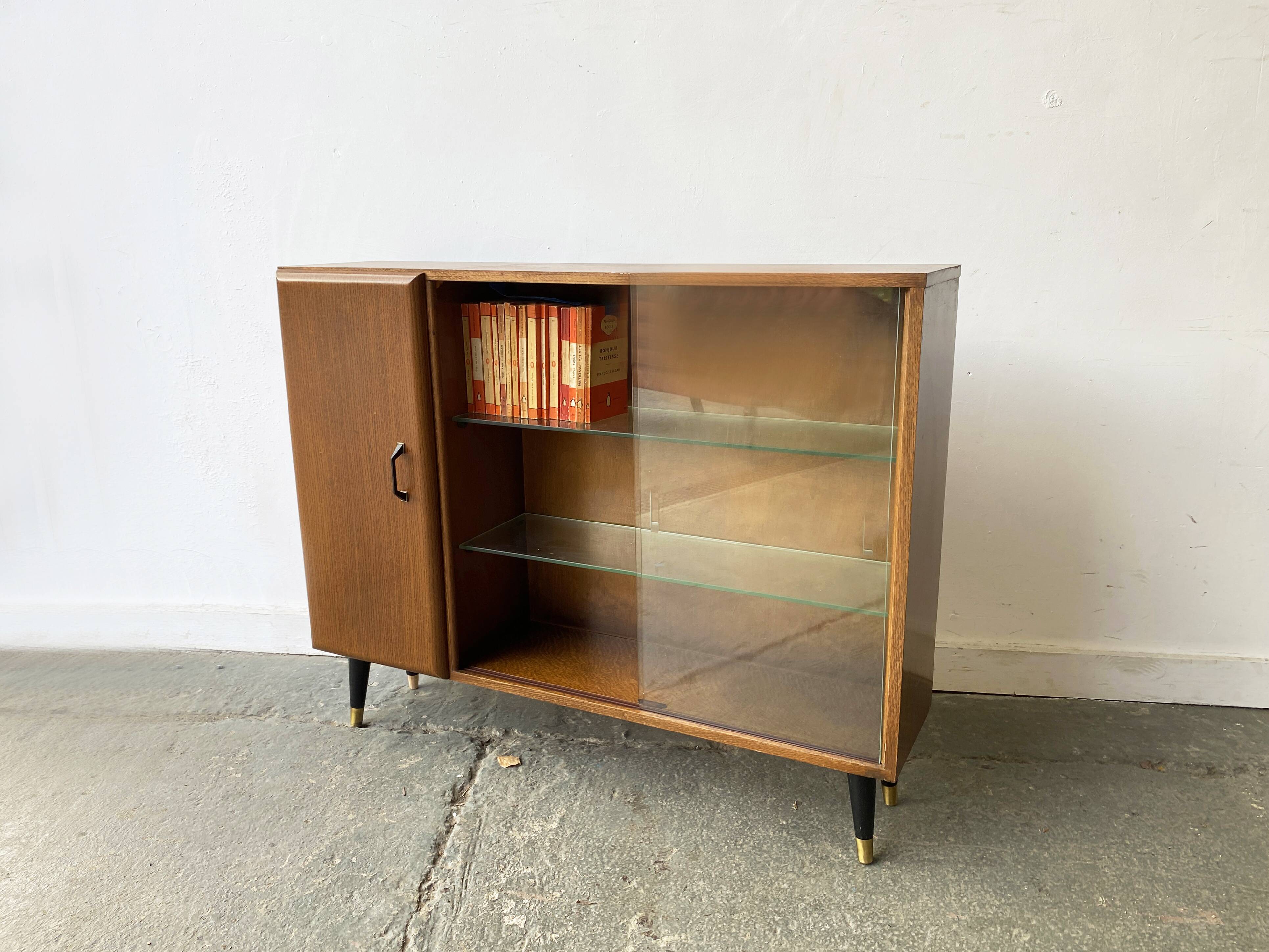 Mid Century vintage  bookcase with sliding glass doors by Turnidg