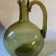 Green blown glass carafe