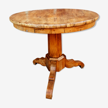 Light wood pedestal table