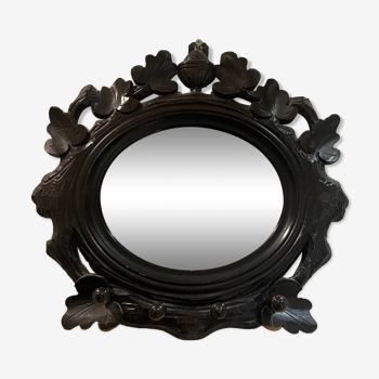 Carved wooden mirror with hooks