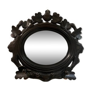 Miroir en bois sculpté