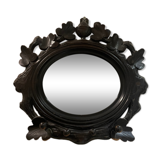 Carved wooden mirror with hooks