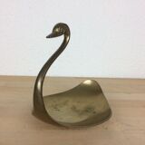 Empty golden brass swan pocket