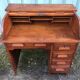 Bureau vintage dit bureau américain à rideau en chêne