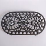 Large vintage black cast iron trivet