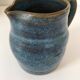Set of artisanal ceramics in shades of blue.