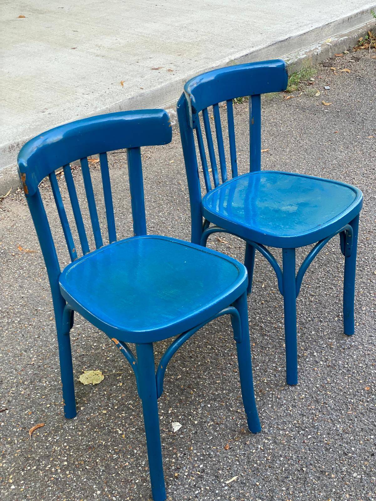 2 blue bistro chairs in curved solid wood