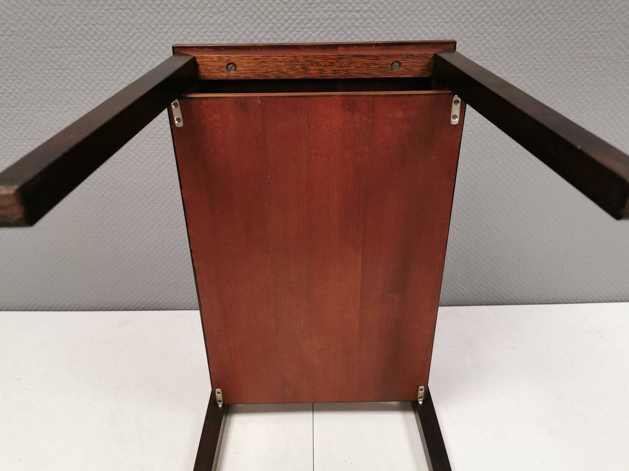 Nice side table in rosewood, probably Danish and from the 60s.