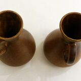 Pair of stoneware pitchers and vases