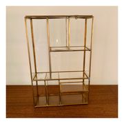 Miniature showcase in glass and gilded metal