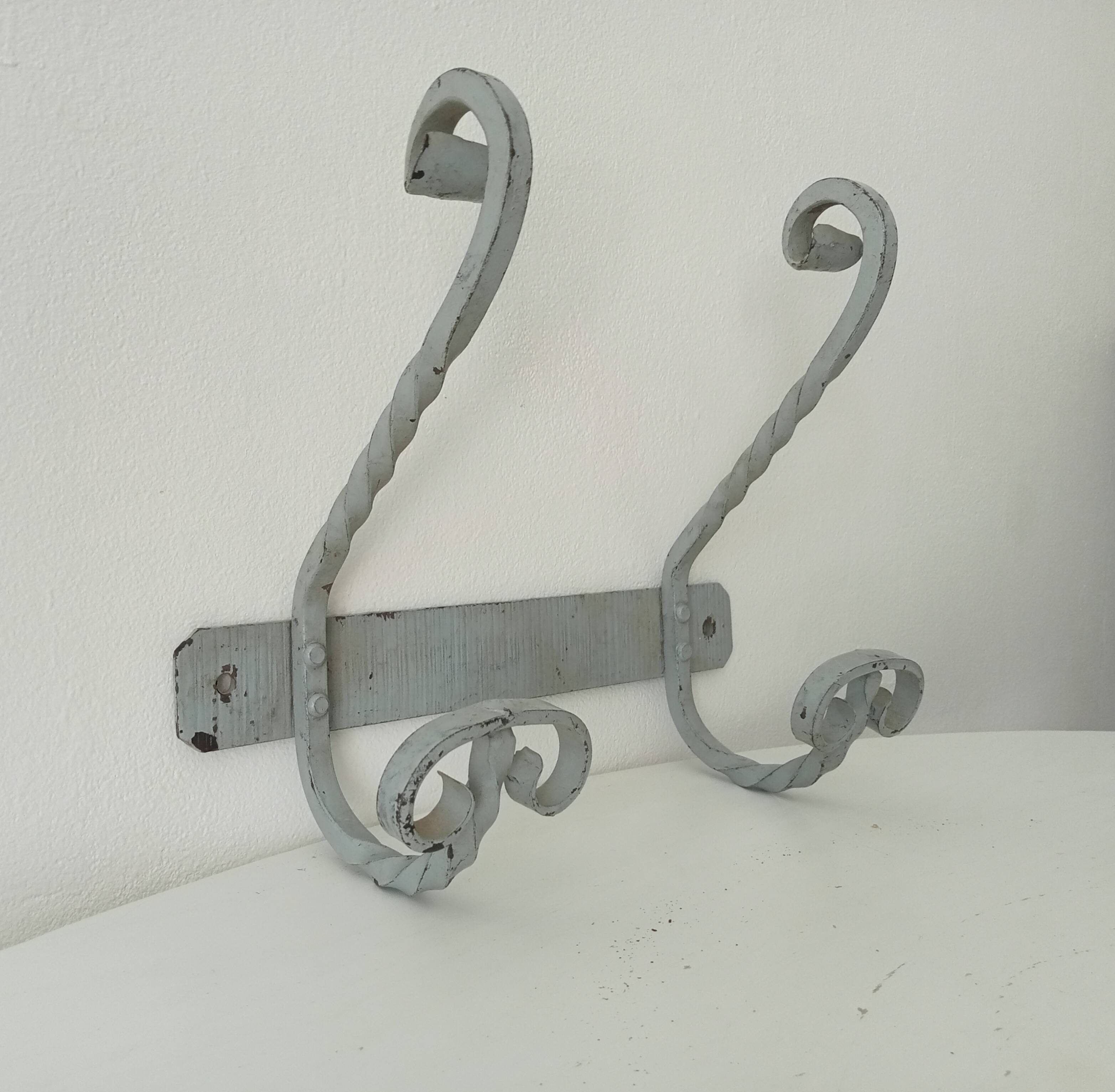 Vintage wrought iron wall coat rack
