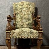 Renaissance ceremonial throne chair with slightly curved back in carved walnut