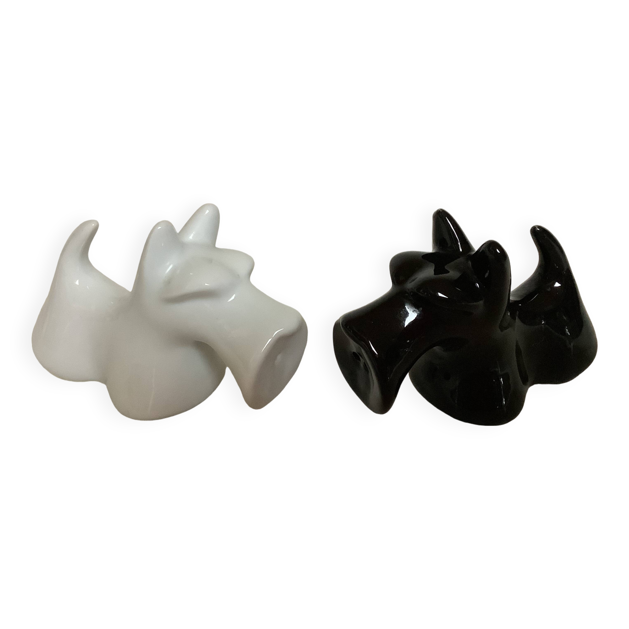 Salt and pepper black and white dogs.