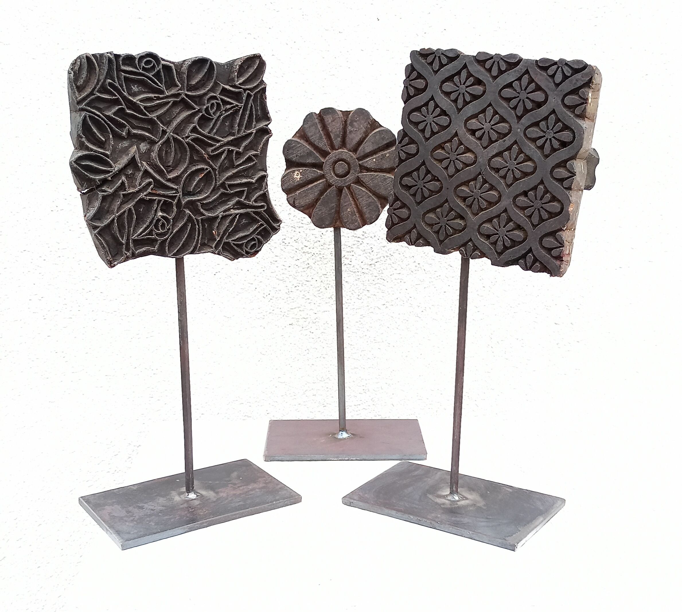 Set of three old ink pads on a base
