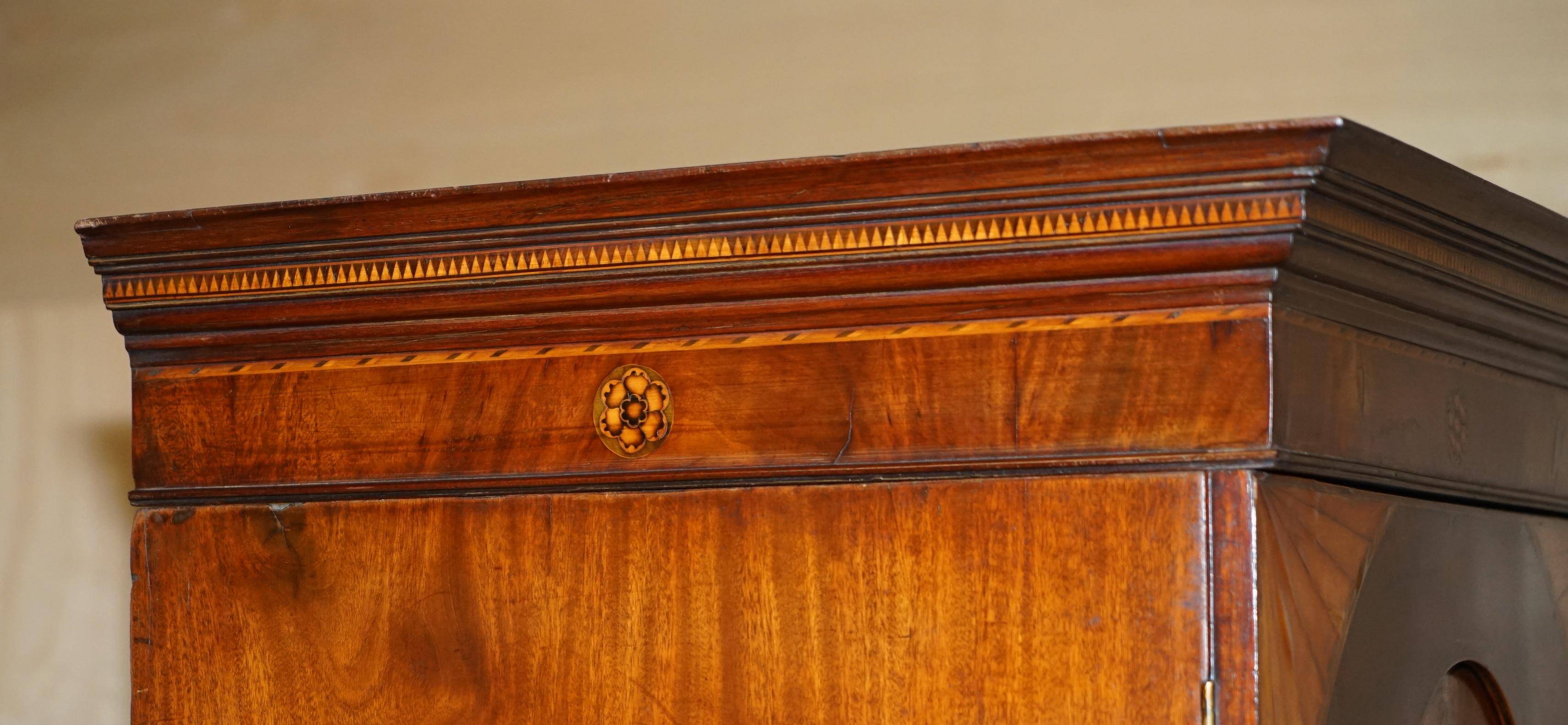 George III Sheraton linen cupboard in walnut, circa 1760.
