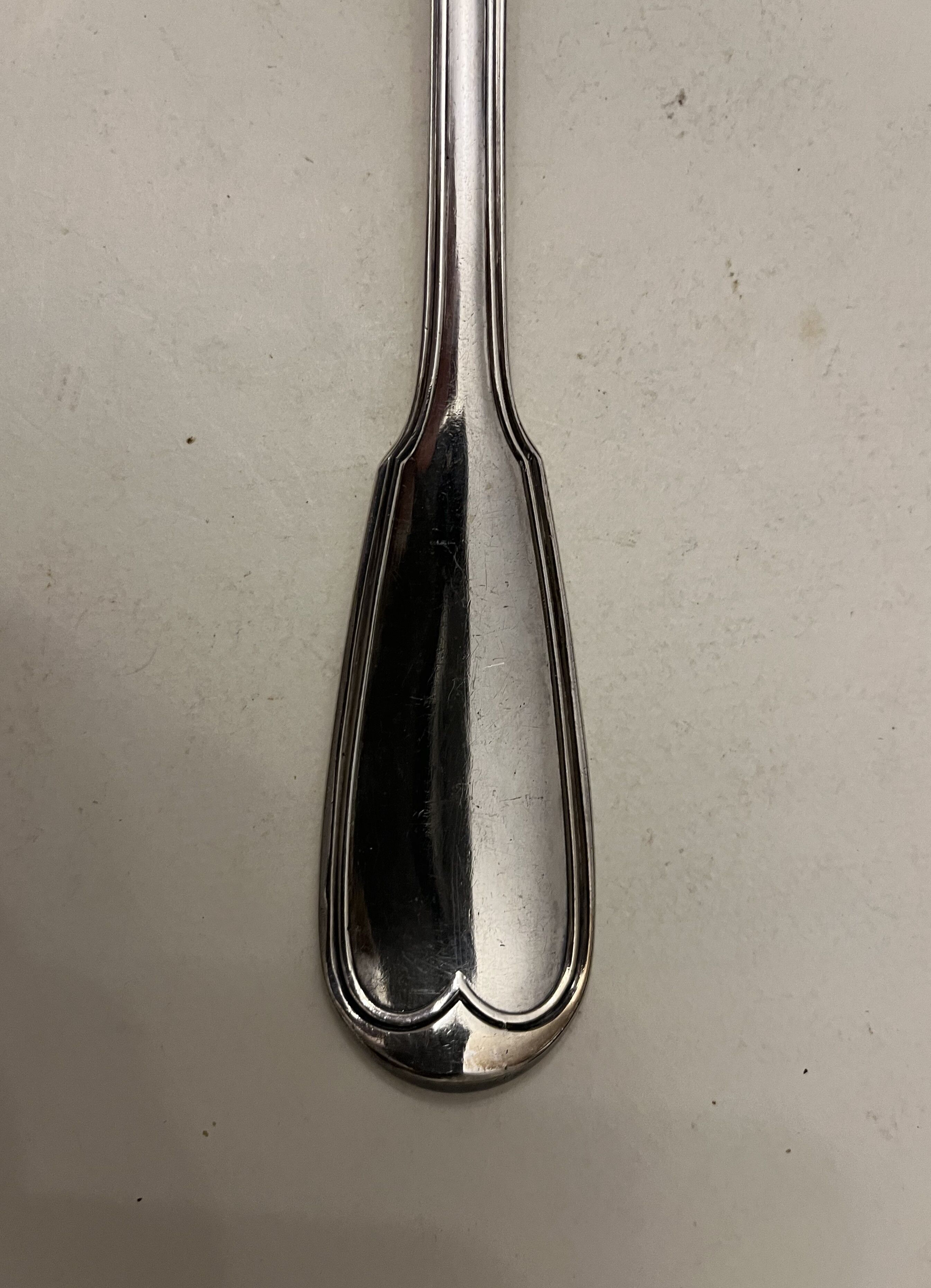 Silver metal ladle