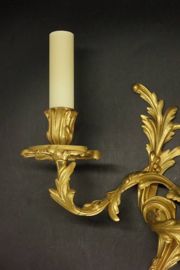 Large pair of stamped wall sconces in Louis XV style - gilded bronze
