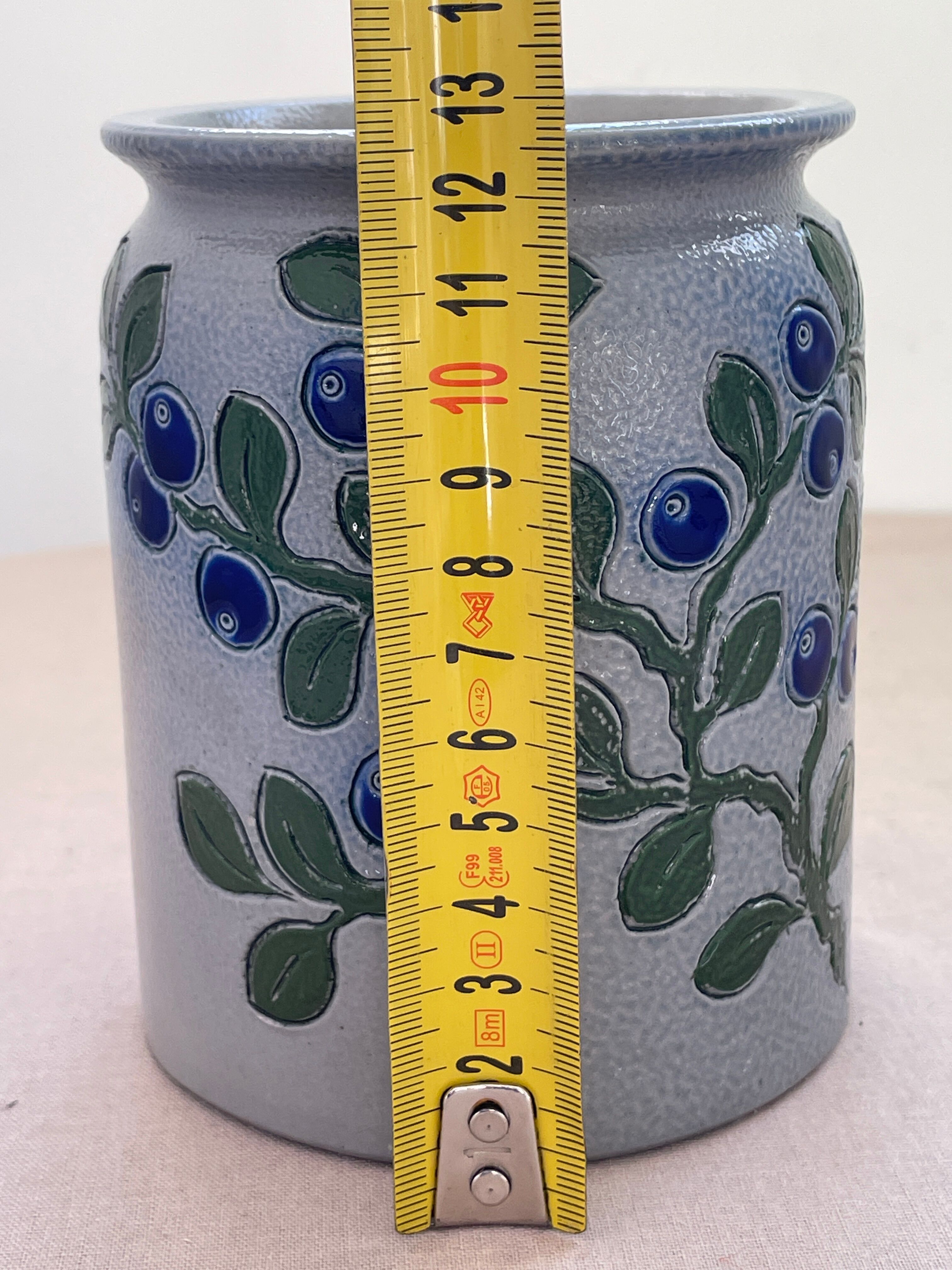 Vintage stoneware pot from Betschdorf signed TA Gilbert with olive decoration.