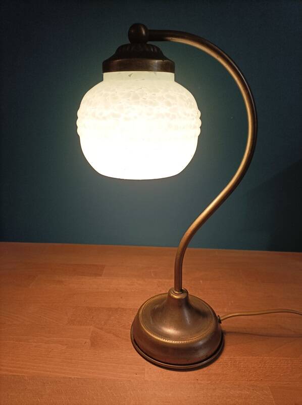 Bedside lamp in room with patinated golden globe Clichy blue
