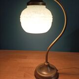 Bedside lamp in room with patinated golden globe Clichy blue