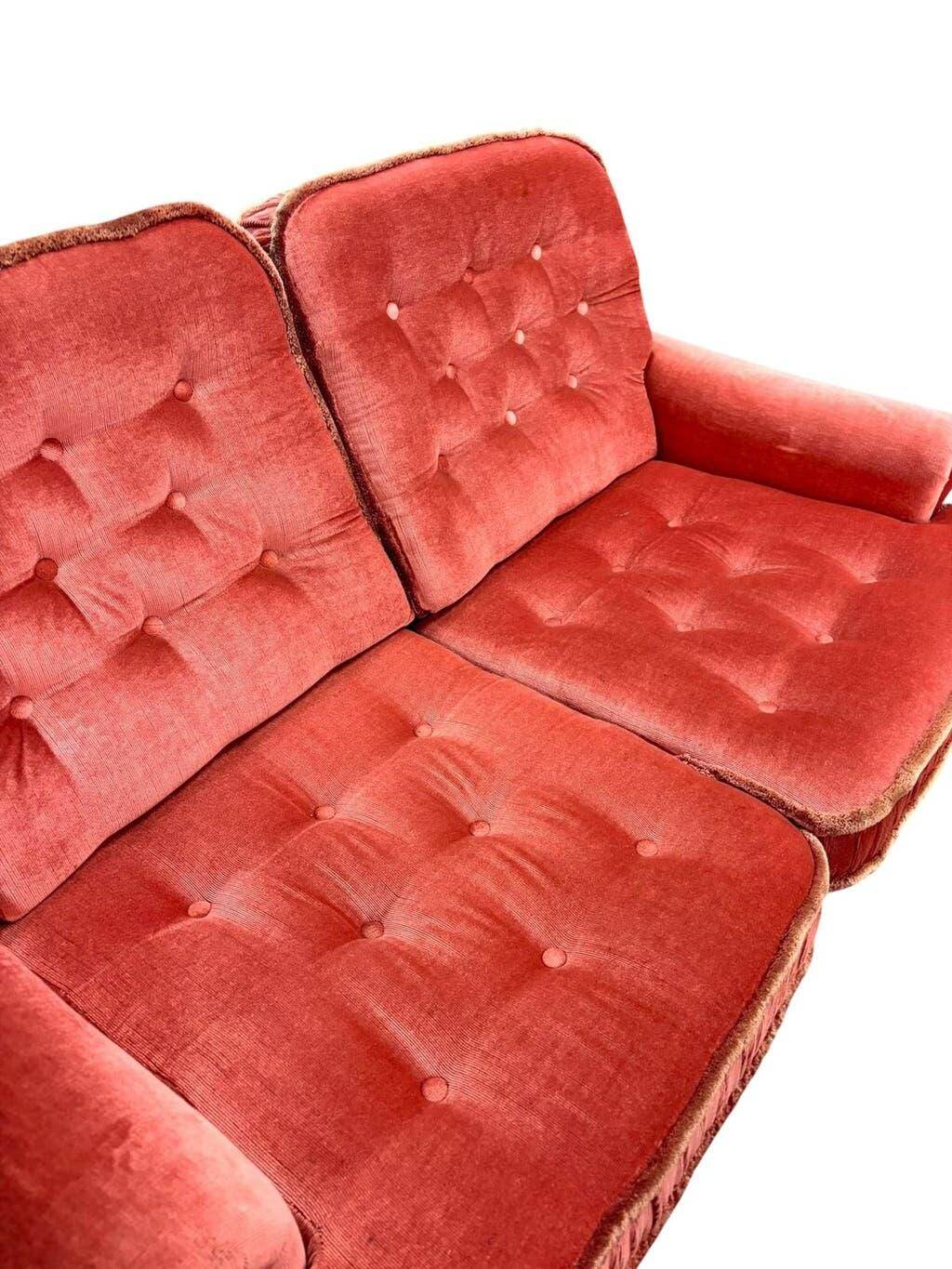 Vintage pink two-seater sofa with fringes
