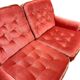 Vintage pink two-seater sofa with fringes