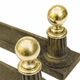 Pair of cast iron channels and brass ball 19th antique fireplace accessory