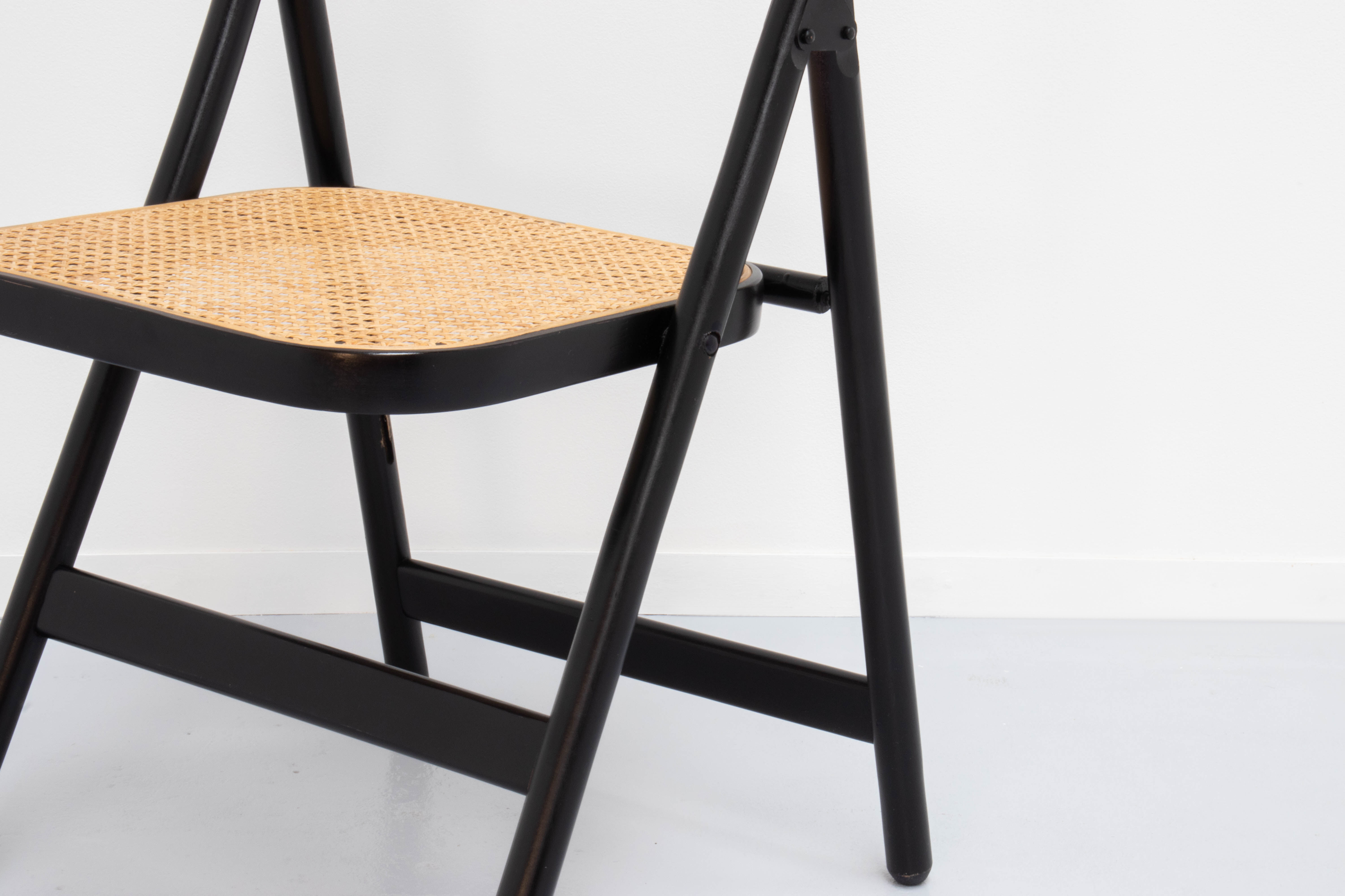 4 vintage wood folding chairs with cane seating