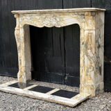 Louis XV style fireplace in purple breccia marble, circa 1880