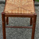Paire de tabourets années 50 en bois et assise paillée
