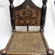 Traditional low chair in wood and leather