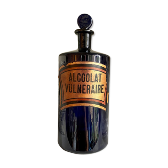 Vulnerary alcoholate apothecary bottle in blue glass