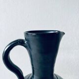 Black glazed stoneware pitcher