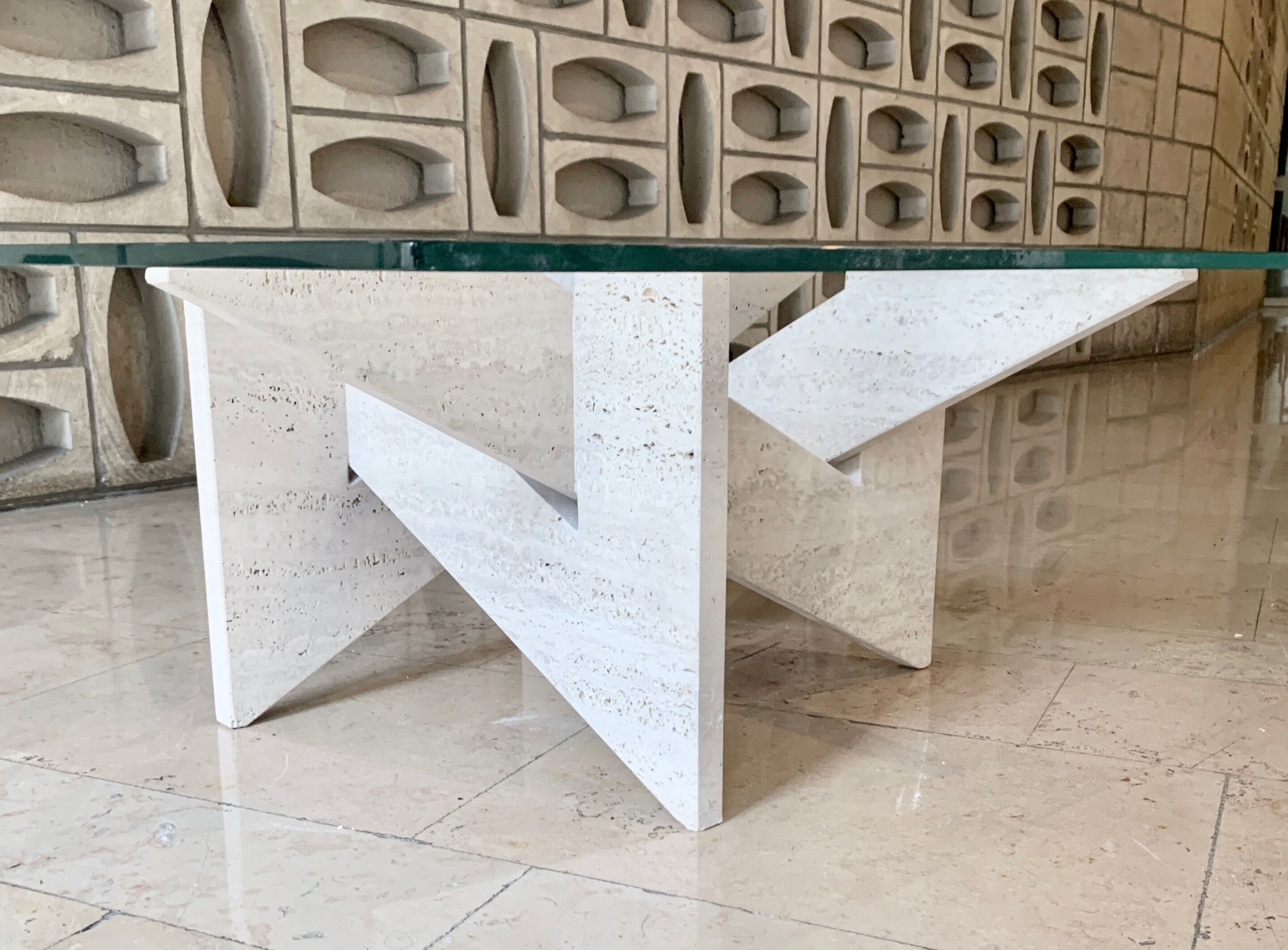Travertine sculptural coffee table with square top